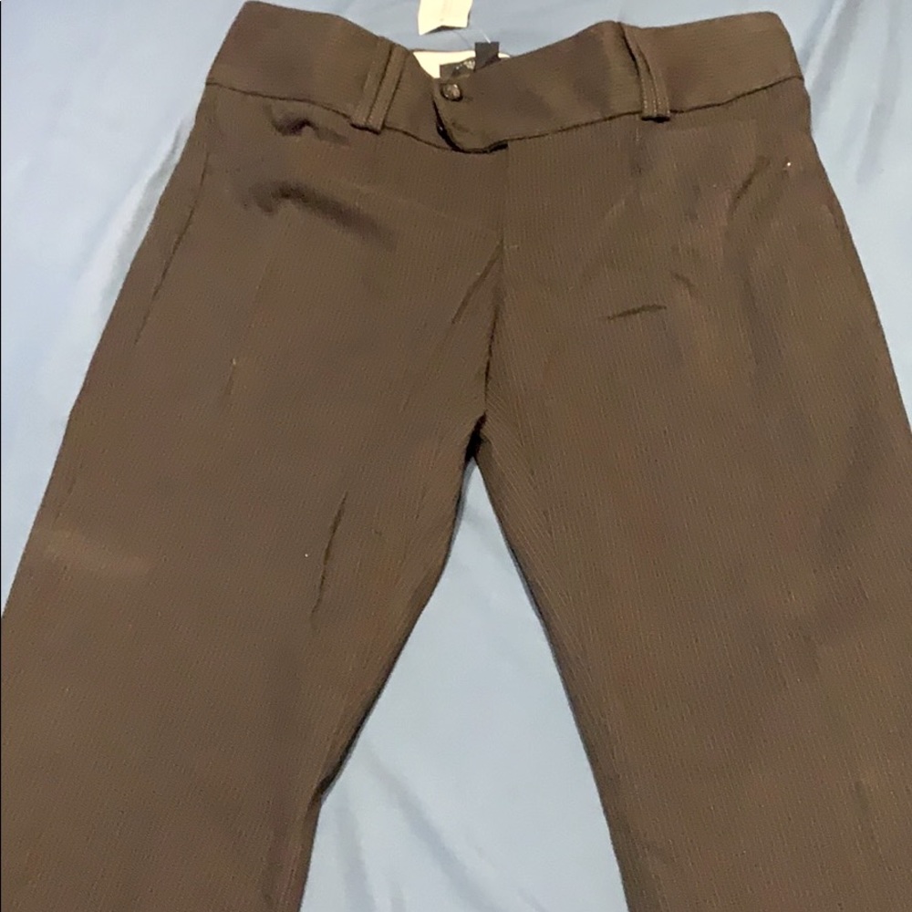Women’s black slacks with purple pin stripe.